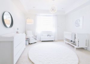 All white minimalist nursery by Little Crown Interiors