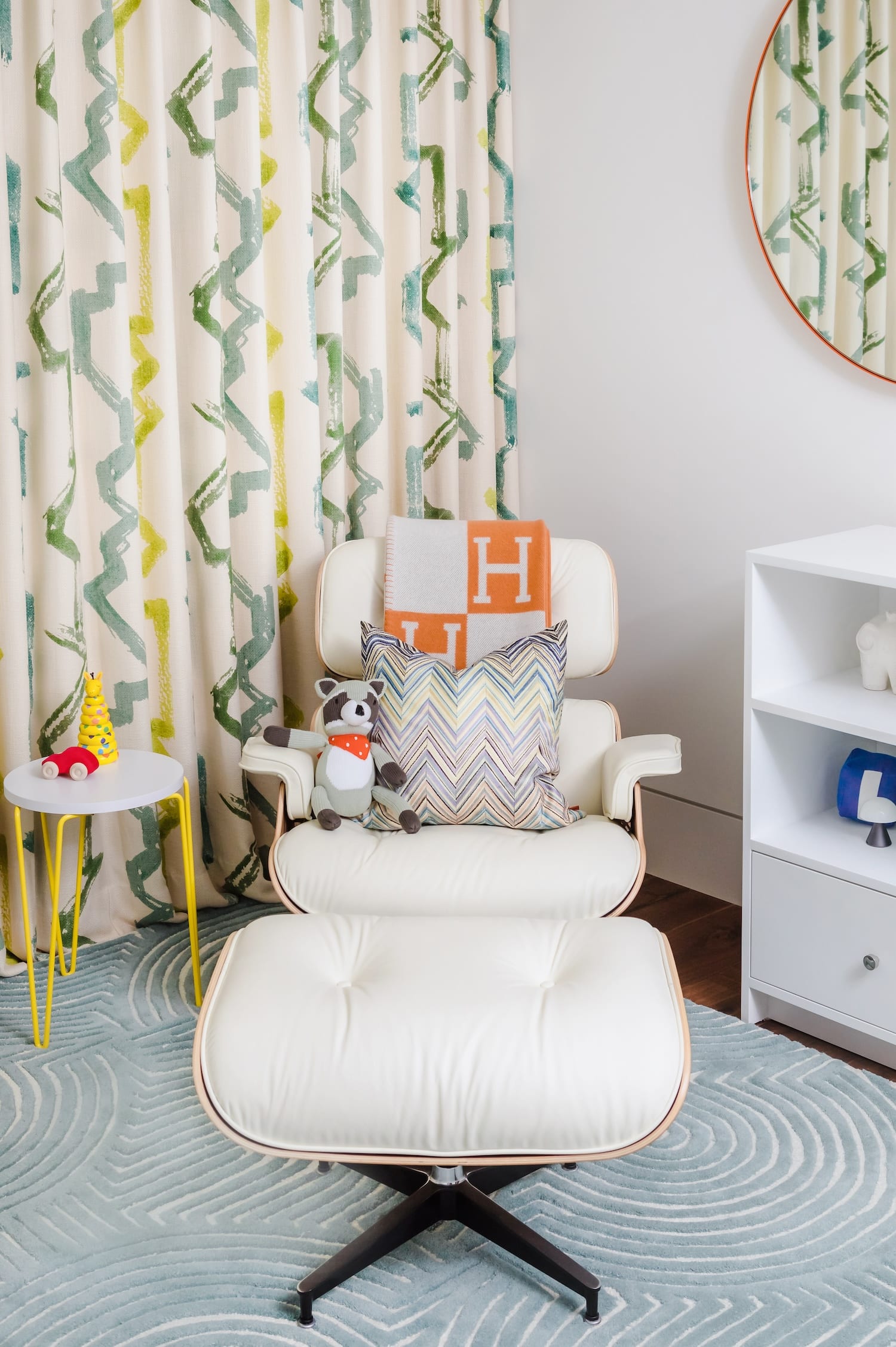 Colorful Modern Safari Nursery Design with Eames Lounger