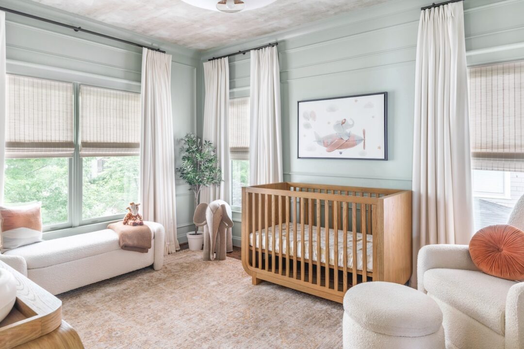 Sage Green Nursery Design with Paneling & Earth Tones