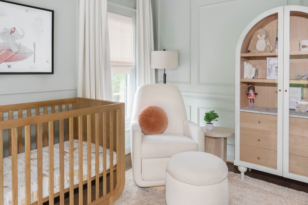 Sage Green Nursery Design with Paneling & Earth Tones